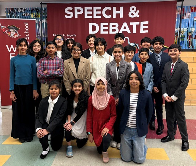 Moody Speech and Debate students standing together