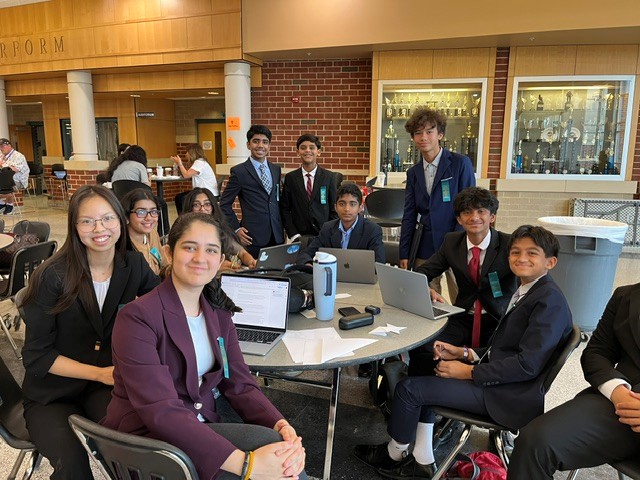 Moody debate students preparing together at a tournament